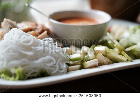 Minced Pork Sausage, Fermented Rice Noodle & Vegetable Served With Chili Sauce. Vietnamese Food Call
