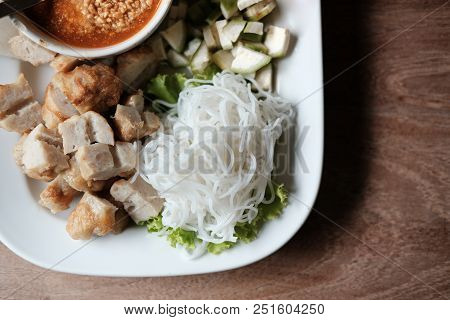 Minced Pork Sausage, Fermented Rice Noodle & Vegetable Served With Chili Sauce. Vietnamese Food Call