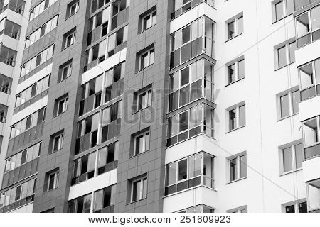 New Multi-apartment Residential Building. Windows And Logias. Behind Every Window People Live.