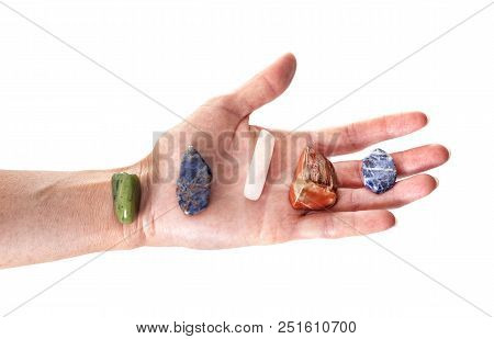 Stone In Hand In Front Of White Background