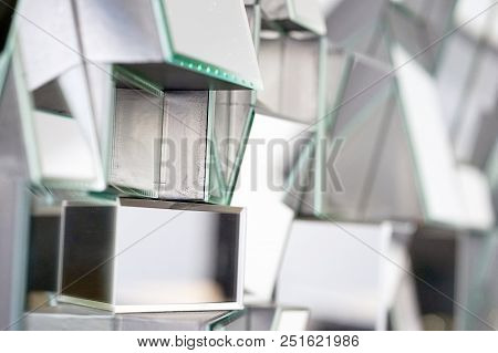 Mirror With Foursquare In Wall, Decoration And Reflection. Abstract Glass Background. Polygonal Surf