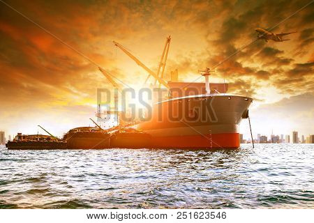 Large Container Ship Loading Industry Product In Urban Harbor And Cargo Plane Flying Above