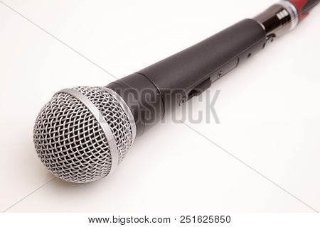 Sing Microphone With Cable Isolated On White Background