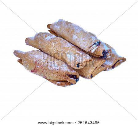 Cookies Rolled With Cherries And Black Currants Isolated On A White Background. Sweet Dessert.