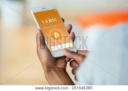 African American Person Sending A Bitcoin Btc Crypto Transaction Using  Mobile Phone Wallet - Black