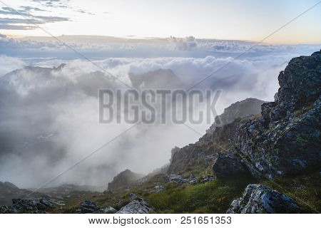 Summer Landscape With High Mountains And Clouds In A Summer Day