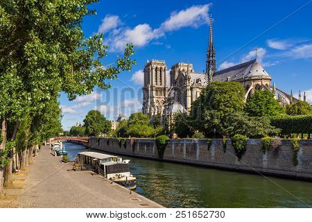 Notre Dame De Paris Cathedral, Seine River And Quai De Montebello In Summer. Ile De La Cite, Paris, 