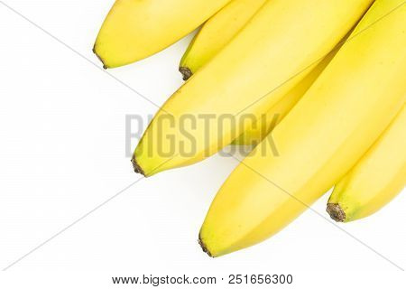 Group Of Six Whole Fresh Yellow Banana One Cluster Flatlay Isolated On White Background