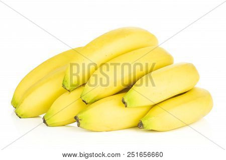 Group Of Eight Whole Fresh Yellow Banana Isolated On White Background