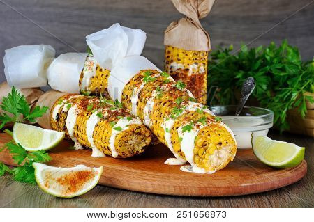 Delicious Fried Corn, Grated With Lime, Poured With Sauce And Seasoned With Spicy Spices. Indian And