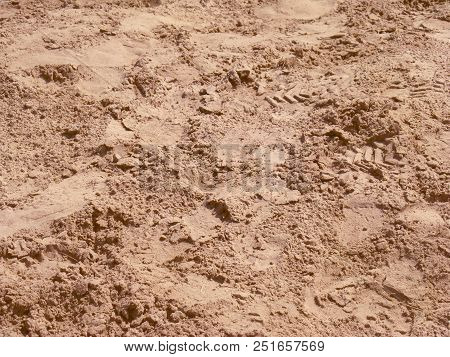 Spilled Orange Red Sand With Close-up Trails