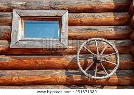 Wooden Wall Of A Log House