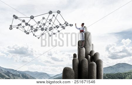 Young Female Doctor With Folder In Hands Satnding On Stone Column. 3d Rendering
