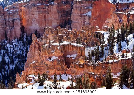 Red And Orange Hoo Doos And Cliffs In Bryce Canyon National Park, Utah