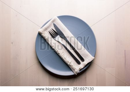 Top View Of A Restaurant Table With Plate, Knife And Fork, Restaurant Concept