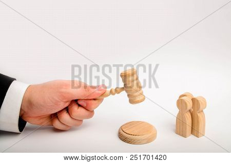 Three Men And A Hammer Of The Judge. The Trial Of Cases In Court, The Resolution Of A Dispute Betwee