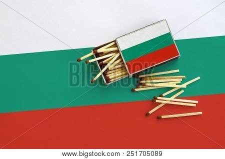 Bulgaria Flag  Is Shown On An Open Matchbox, From Which Several Matches Fall And Lies On A Large Fla