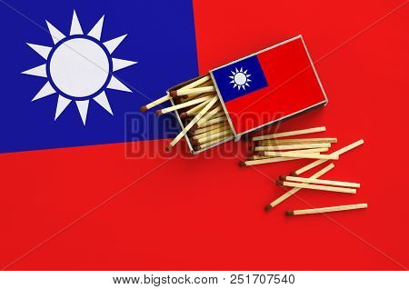 Taiwan Flag  Is Shown On An Open Matchbox, From Which Several Matches Fall And Lies On A Large Flag.