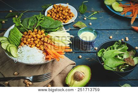 Top View Of Ingredient Set For Cooking Vegan Food, Fried Chickpeas, Rice Noodles With Wegetables On 