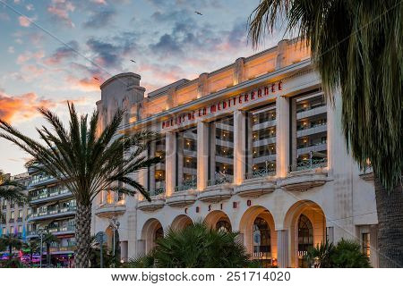 Famous Palais De La Mediterranee Hotel On Promenade Des Anglais At Sunset In Nice France