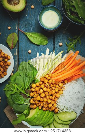 Top View Of Ingredient Set For Cooking Vegan Food, Fried Chickpeas, Rice Noodles With Wegetables On 