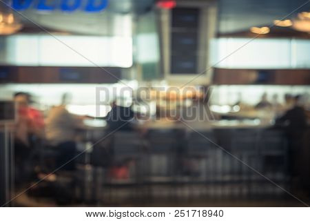 Vintage Blurred People Dining In At Airport Sport Bar