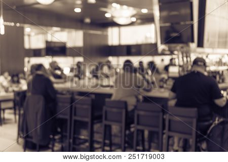 Vintage Blurred People Dining In At Airport Sport Bar