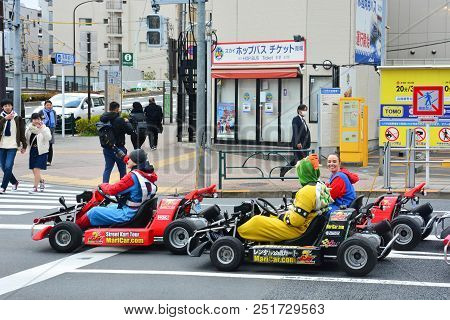 Tokyo, Japan - March 7, 2018 : Street Kart Tour, Mario Kart Tour Is Tourists Dress Up In Superhero C