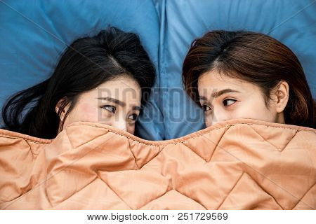 A Top View Photo Close Up To Couple Asian Woman Are Lesbian Sleeping Ont The Blue Bed. Couple Concep