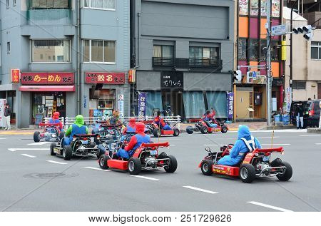 Tokyo, Japan - March 7, 2018 : Street Kart Tour, Mario Kart Tour Is Tourists Dress Up In Superhero C