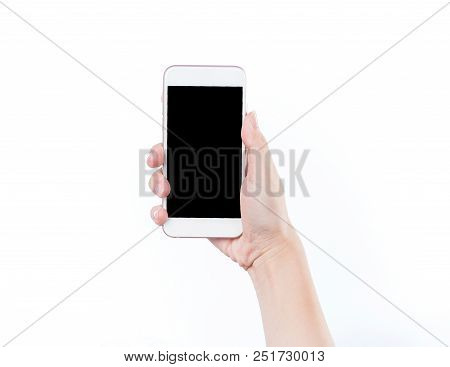 Concept Of Woman's Hand Holding A Smartphone Isolated On White Background, Clipping Path, Blank For 