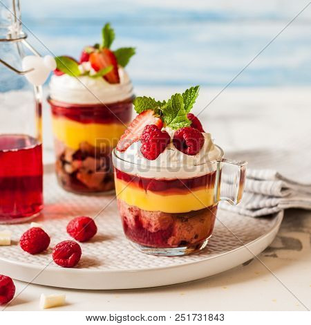Fruit Cake, Jelly, Custard, Berry And White Cocolate Whipped Cream Individual Trifles, Square
