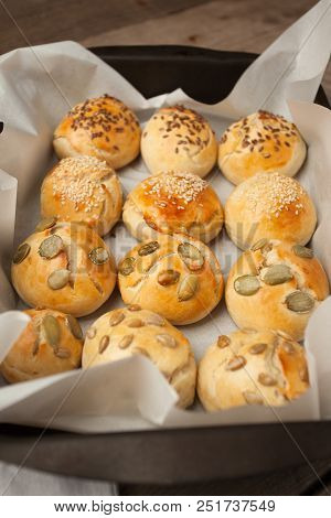 Fresh Homemade Hamburger Buns, Brioche With Sesame, Pumpkin, Flax, Sunflower Seeds On The Tray, Conc