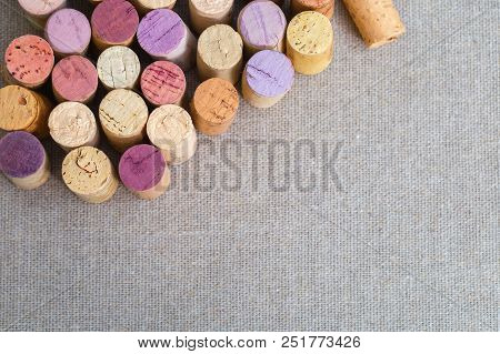 Multicolor Close Up Corks From Wine Bottles In Linen Fabric Background. Cope Space. Old Used Corks F