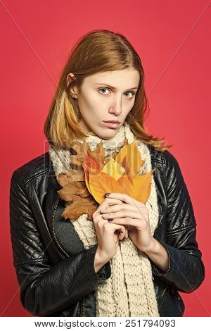 Woman With Autumn Leaves In Leather Jacket.