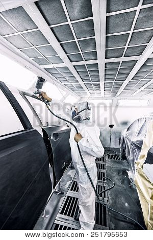 Restoration Painting Of A Black Car In The Service Center.