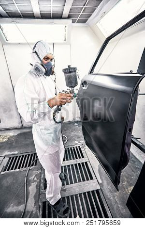Restoration Painting Of A Black Car In The Service Center.