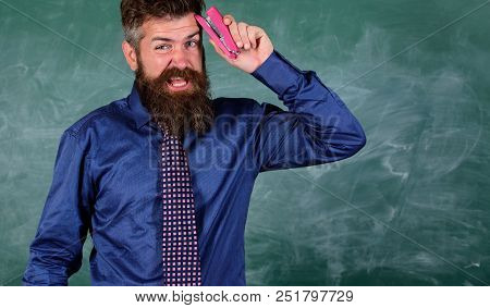 Pin It On Mind. Teacher Bearded Man With Pink Stapler Chalkboard Background. Teaching Memorization T