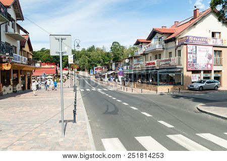 Krynica Morska, Poland - July 11, 2018: Unidentified People On Street In Krynica Morska.