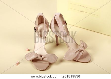 Woman Summer Shoes With Accecories On Background