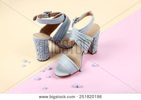 Woman Summer Shoes With Accecories On Pink Background