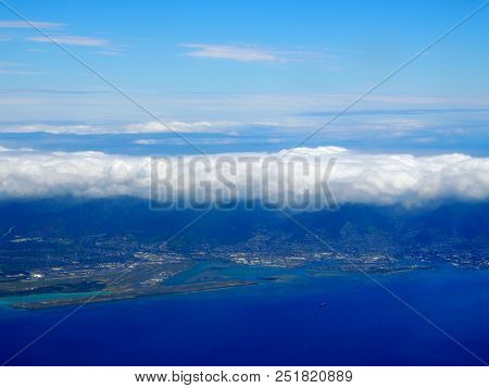 Honolulu International Airport Coral Runway And City Seen From The Air With Surrounding Water On Oah