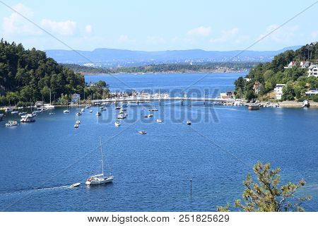 Oslo, Norway - July 22, 2018: View To Oslo Fjord. Two Islands Ormoya And Malmoya Connected To The Ma
