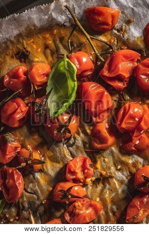 Roasted Cherry Tomotoes. Mediterranean Food Recipe Idea.