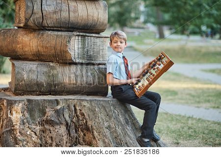 Boy With Large Abacus