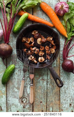 Tasty Nutritious Vegetarian Meal. Fried Slippery Jack Mushrooms (suillus Luteus) In Cast Iron Pan Wi