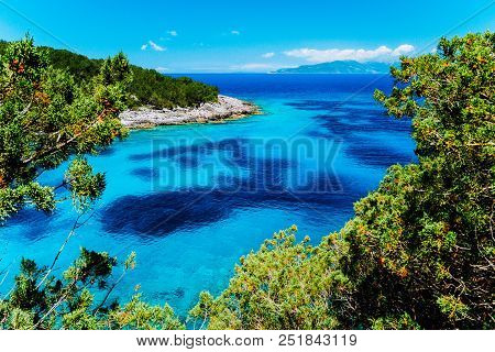 Dafnoudi Beach In Kefalonia, Greece. Remote Lagoon With Pure Crystal Clean Turquoise Sea Water, Surr