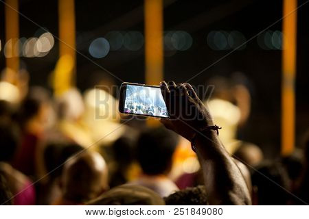 VARANASI, UTTAR PRADESH, INDIA - JULY 9, 2018: Ganga Aarti ceremony at Dasashvamedh Ghat with thousand of prayers each evenning.