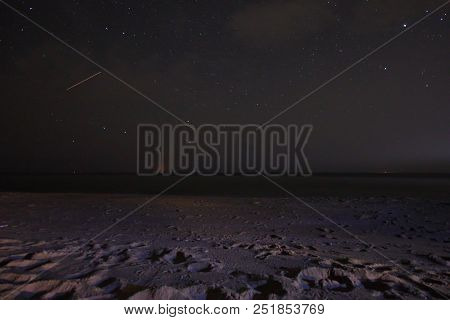 A View Of The Stars Of The Milky Way With A Mountain Top In The Foreground. Night Sky Nature Summer 