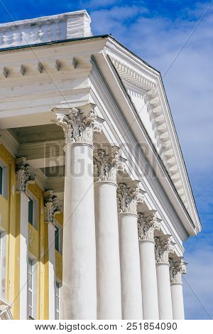 Front Of Old Buildig With Columns On Sky Background. Alexander Butlerov Chemistry Institute Of Kazan
